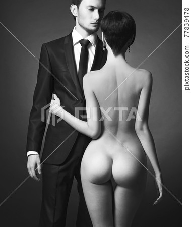 Portrait of young elegant couple. Sexy beautiful lovers 77839478