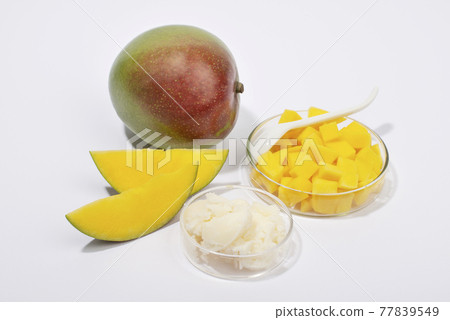 Mango butter and fresh mango fruit. Organic cosmetic, skin care, spa concept. 77839549