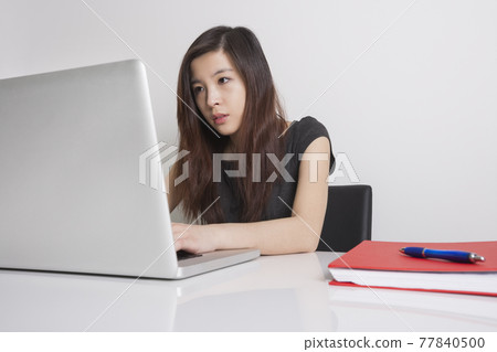 Cute asian girl at home Cute asian girl at home 77840500