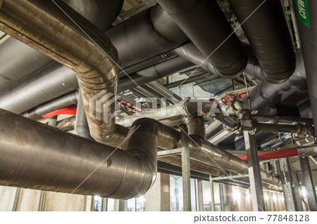 Big pipe under the building 77848128