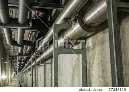 Big pipe under the building 77848129