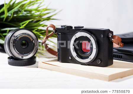 mirrorless camera with leather strap 77850870