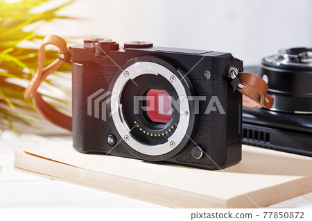 mirrorless camera with leather strap mirrorless camera with leather strap 77850872