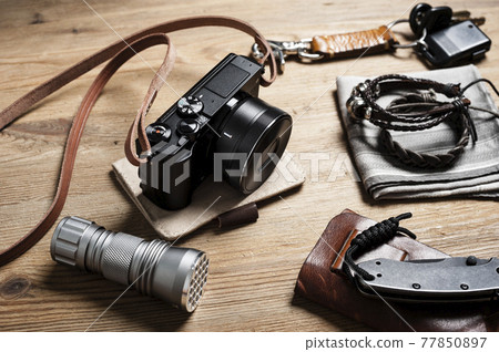 mirrorless camera with leather strap 77850897