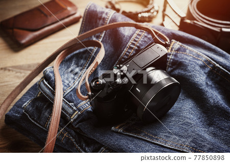 mirrorless camera with leather strap 77850898
