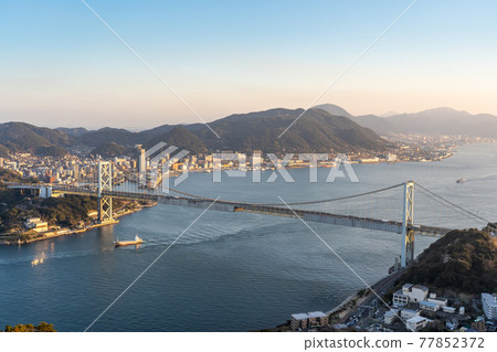 View of the Kanmon Strait from Hinoyama Park in the evening in Shimonoseki City, Yamaguchi Prefecture 77852372
