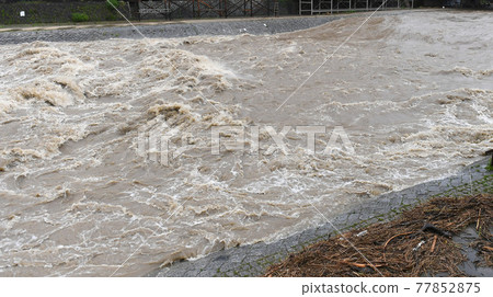 River that was flooded by heavy rain 77852875