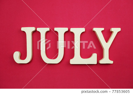 July alphabet letter with space copy on pink background July alphabet letter with space copy on pink background 77853605