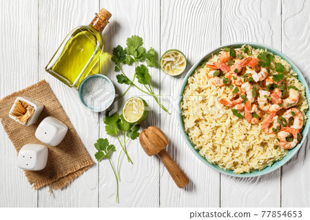 Lime shrimps with cilantro and rice, top view Lime shrimps with cilantro and rice, top view 77854653