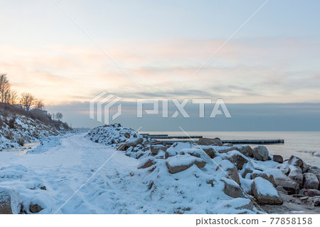 Gloomy Baltic Sea in winter season 77858158