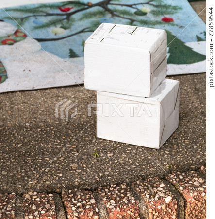 Two white packages left on front stoop Two white packages left on front stoop 77859544