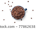 Coffee cup and coffee beans on a white background 77862638