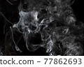 Smoke isolated on black background. Movement of white smoke 77862693