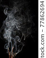 Creative illustration of incense stick aroma with smoke isolated on black background 77862694