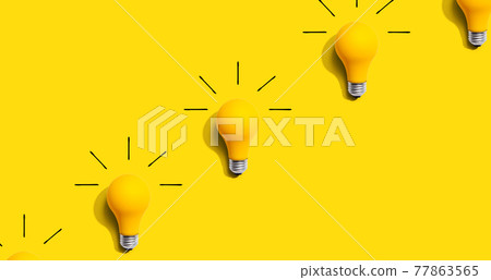 Yellow light bulb pattern with shadow 77863565