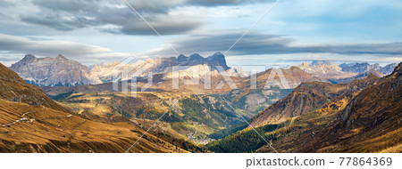 Autumn alpine Dolomites mountain scene near Pordoi Pass, Trentino , Italy. Autumn alpine Dolomites mountain scene near Pordoi Pass, Trentino , Italy. 77864369