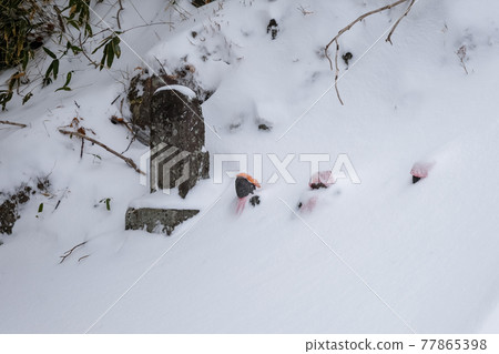 Nikko Yumoto Onsen, Nikko City, Tochigi Prefecture Jizo of a hot spring shrine with snow 77865398