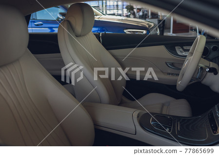 Beautiful leather interior of the modern car. Beautiful leather interior of the modern car. 77865699