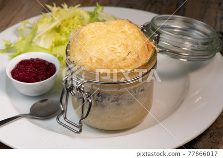 Beef pie recipe with red beet sauce cooked with chili spices and salad Beef pie recipe with red beet sauce cooked with chili spices and salad 77866017