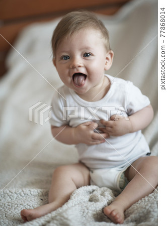 cute little newborn baby smilling 77868014