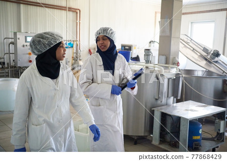 business woman team in local cheese production company 77868429