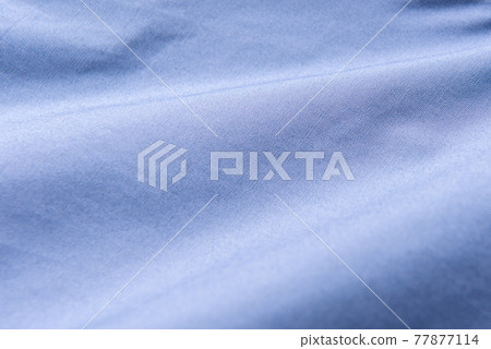Closeup of rippled blue silk fabric, Blue fabric texture background, Closeup of rippled blue silk fabric, Blue fabric texture background, 77877114