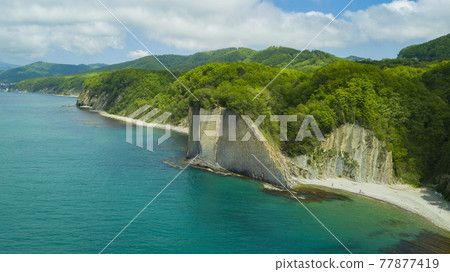 Drone view of rocks, nature, sea and water - Skala Kiseleva is a natural monument on the territory of the Tuapse district of the Krasnodar Territory. Aerial view from above. 4K footage. Drone view of rocks, nature, sea and water - Skala Kiseleva is a natural monument on the territory of the Tuapse district of the Krasnodar Territory. Aerial view from above. 4K footage. 77877419