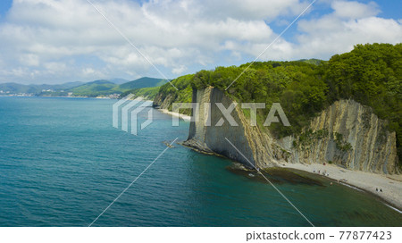 Drone view of rocks, nature, sea and water - Skala Kiseleva is a natural monument on the territory of the Tuapse district of the Krasnodar Territory. Aerial view from above. 4K footage. Drone view of rocks, nature, sea and water - Skala Kiseleva is a natural monument on the territory of the Tuapse district of the Krasnodar Territory. Aerial view from above. 4K footage. 77877423