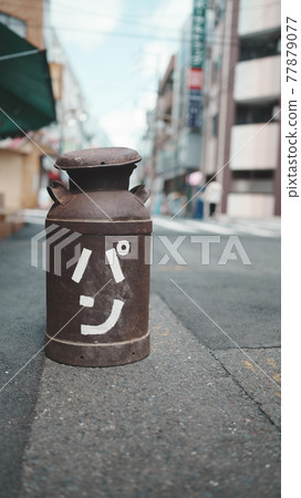 A cute and interesting signboard of a bakery 77879077