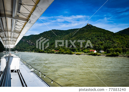 Cruise the Donau River towards the Merk Temple in the Wachau Valley 77883240