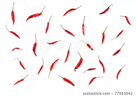 Chilli peppers on white table. Abstract background 77883642