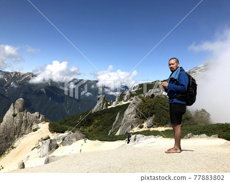 Wild man climbing Mt. Tsubakuro 77883802