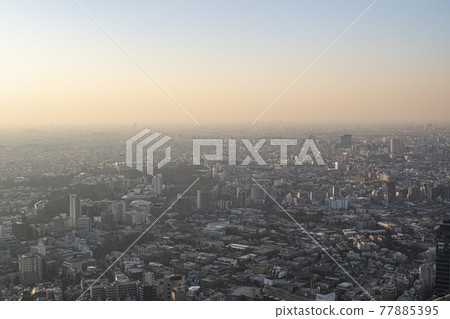 Tokyo streets dyed red in the setting sun 77885395