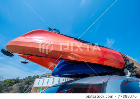 Put a sea kayak in a car / marine sports 77888376