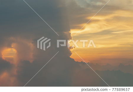 Beautiful sunset sky above clouds with dramatic light, Beautiful blazing sunset landscape. Beautiful sunset sky above clouds with dramatic light, Beautiful blazing sunset landscape. 77889637
