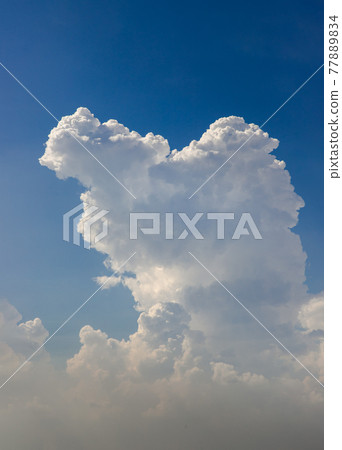 The sun shines through the clouds in the sky.  The shape of the clouds evokes imagination and creativity. They can be used as wallpapers that look amazing. 77889834