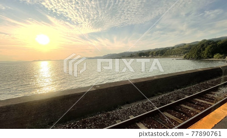 Sunset and railroad tracks Sunset and railroad tracks 77890761