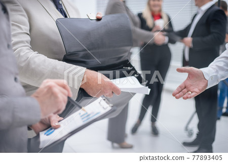 close up. business partners discussing financial schedule close up. business partners discussing financial schedule 77893405