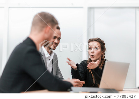 young business colleagues sitting at the office Desk young business colleagues sitting at the office Desk 77893427
