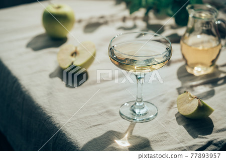 Glass of Apple cider Glass of Apple cider 77893957
