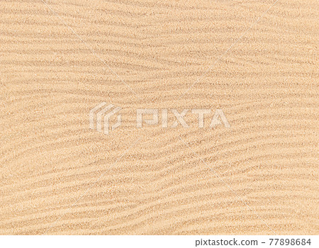 Sand waves texture background, beach top view. Sand waves texture background, beach top view. 77898684