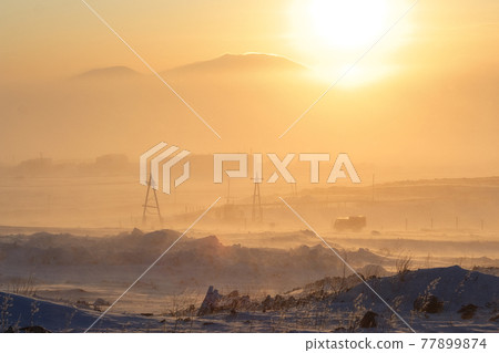 Winter sunset landscape. 77899874