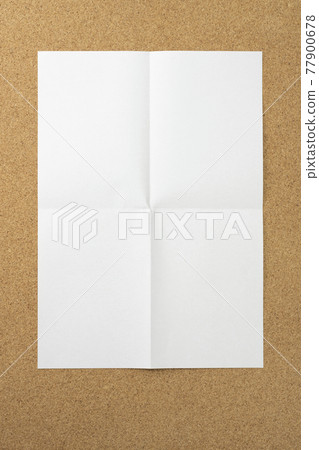 White paper folded in four and opened White paper folded in four and opened 77900678