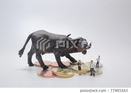 a mini figure with Bull , Stock market Photo 77905883