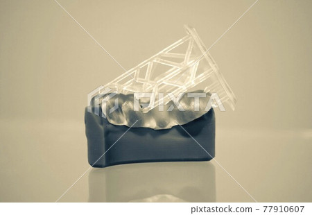 Human jaw printed on 3d printer of photopolymer. Human jaw printed on 3d printer of photopolymer. 77910607