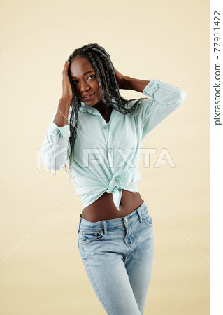 Pretty positive young woman Pretty positive young woman 77911422
