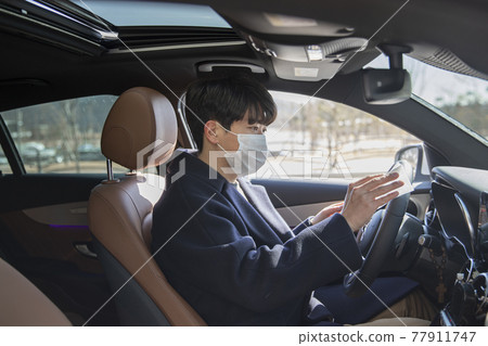 wearing mask in car, covid virus wearing mask in car, covid virus 77911747