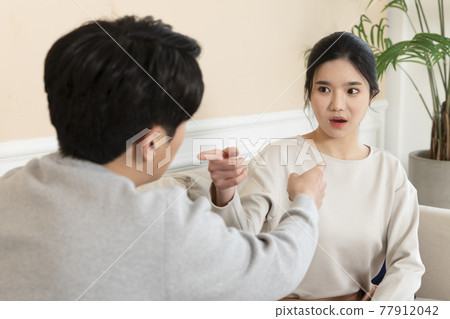 newly married Asian couple fighting at home concept 77912042