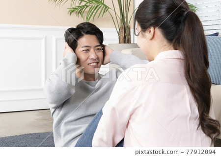 Asian couple home training 77912094