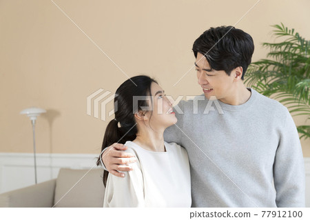 newly married Asian couple at home newly married Asian couple at home 77912100